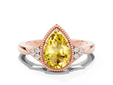 Rose gold Pear Cut Yellow Sapphire Halo Ring with Tapered Band and Four-Prong Setting