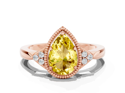 Rose gold Pear Cut Yellow Sapphire Halo Ring with Tapered Band and Four-Prong Setting