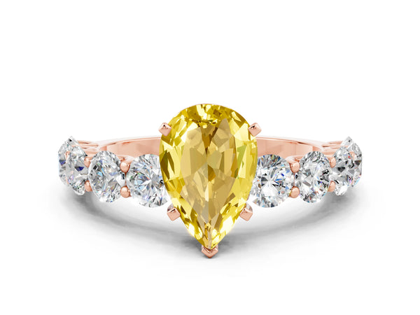 Rose gold Pear Cut Yellow Sapphire Prong Setting with Side Stones on a Pave Band