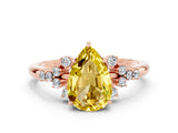 Rose gold Pear Cut Yellow Sapphire Ring with Side Stones and Four-Prong Setting_60