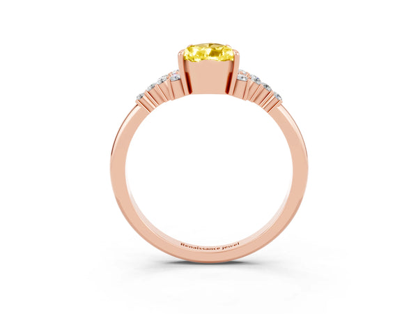 Rose gold Pear Cut Yellow Sapphire Ring with Side Stones and Four-Prong Setting