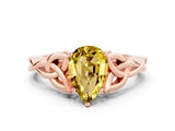 Rose gold Pear Cut Yellow Sapphire Solitaire Engagement Ring with Celtic Knot Band and Four-Prong Setting_24