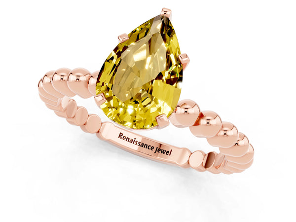 Rose gold Pear Cut Yellow Sapphire Solitaire Ring with Beaded Band and Prong Setting