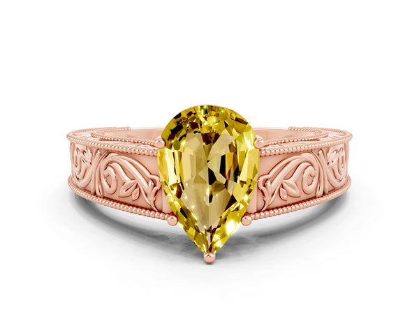 Rose gold Pear Cut Yellow Sapphire Solitaire Ring with Engraved Band and Four-Prong Setting