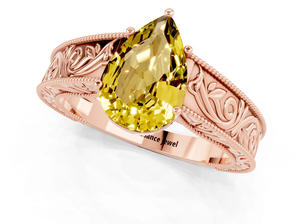 Rose gold Pear Cut Yellow Sapphire Solitaire Ring with Engraved Band and Four-Prong Setting