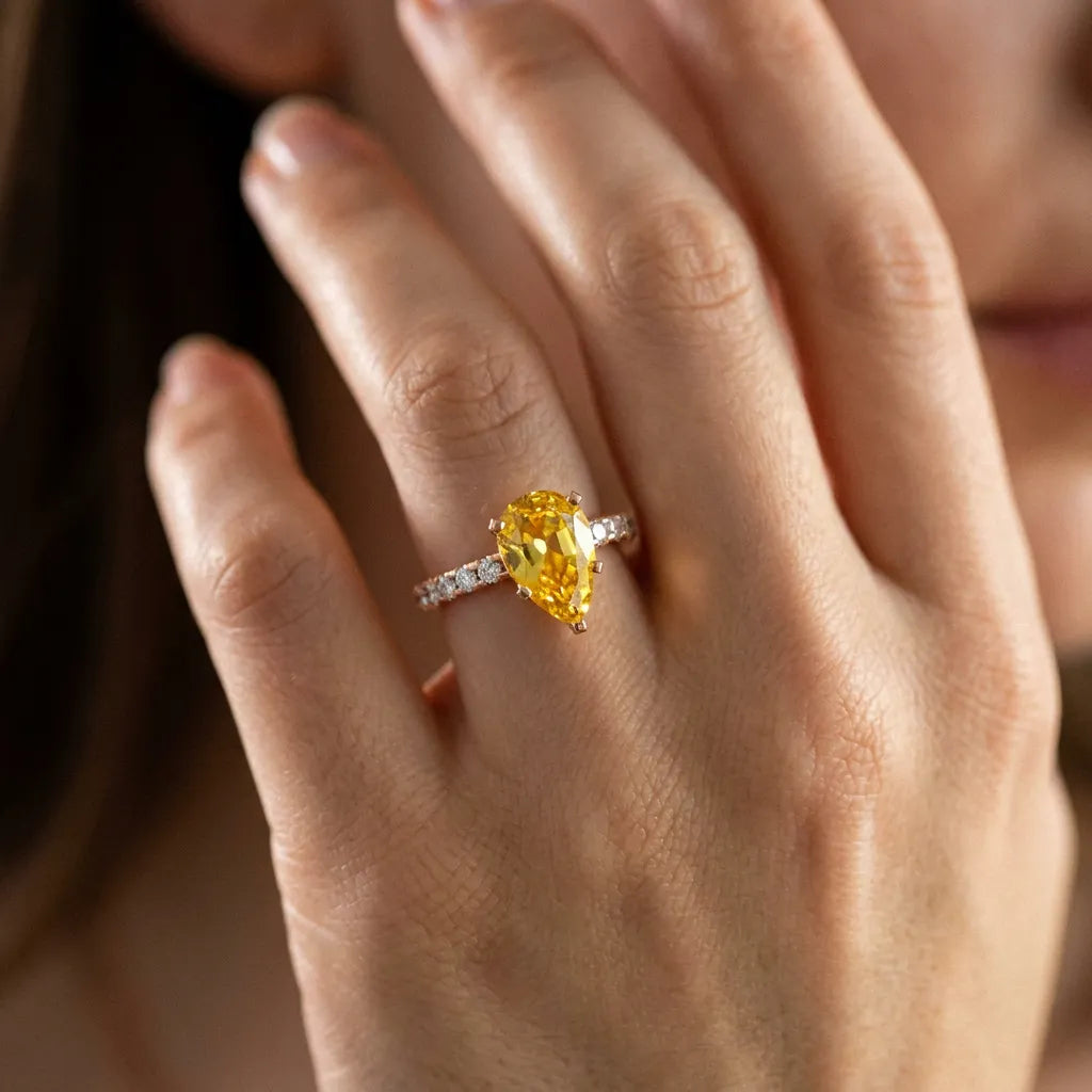 Rose gold Pear Cut Yellow Sapphire Solitaire Ring with Round  Pavé Band and Four-Prong Setting_80