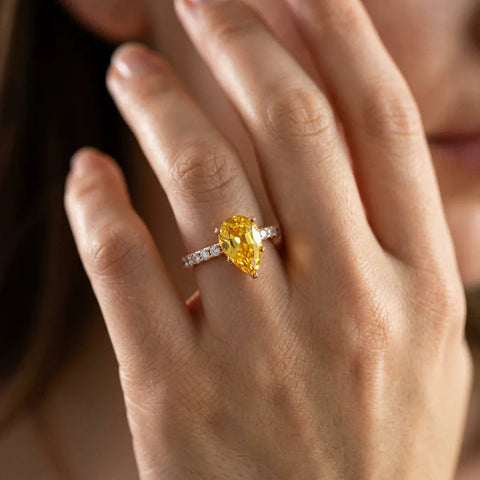 Rose gold Pear Cut Yellow Sapphire Solitaire Ring with Round  Pavé Band and Four-Prong Setting_80