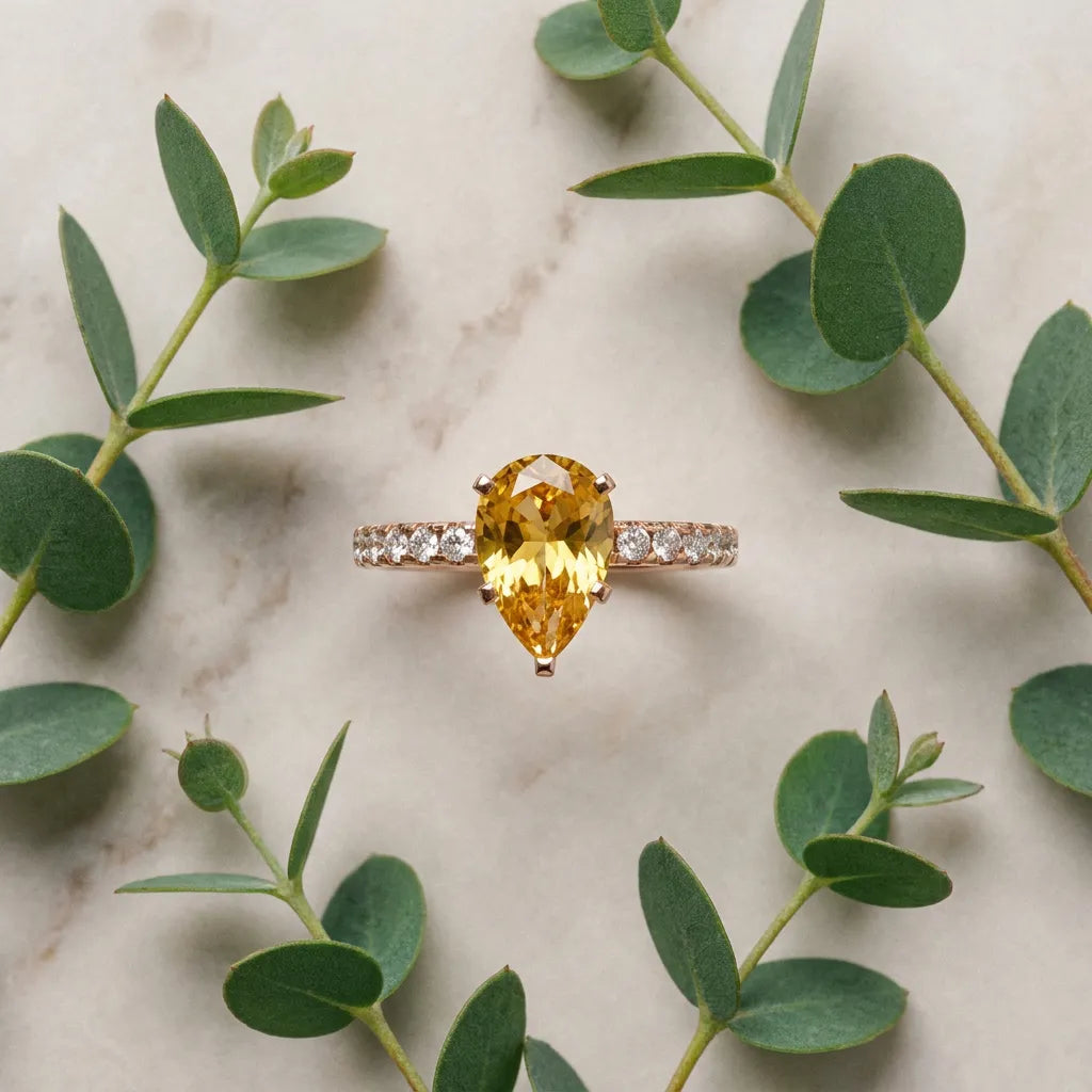 Rose gold Pear Cut Yellow Sapphire Solitaire Ring with Round  Pavé Band and Four-Prong Setting_81
