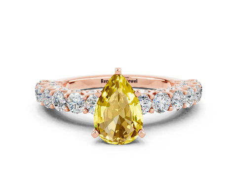 Rose gold Pear Cut Yellow Sapphire Solitaire Ring with Shared Prong Pavé Band and Four-Prong Setting