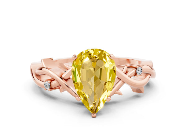 Rose gold Pear Cut Yellow Sapphire Solitaire Ring with Twisted Band and Prong Setting