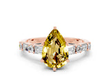 Rose gold Pear Cut Yellow Sapphire Solitaire with Side Baguettes and Channel Set Band_24