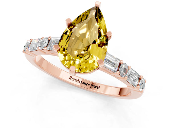 Rose gold Pear Cut Yellow Sapphire Solitaire with Side Baguettes and Channel Set Band