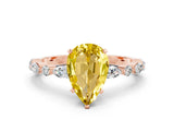 Rose gold Pear Cut Yellow Sapphire Solitaire with Side Stones on a Pavé Band and Four-Prong Setting_24