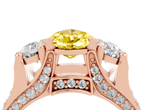 Rose gold Pear Cut Yellow Sapphire Three-Stone Ring with Channel Set Band and Four-Prong Setting_4