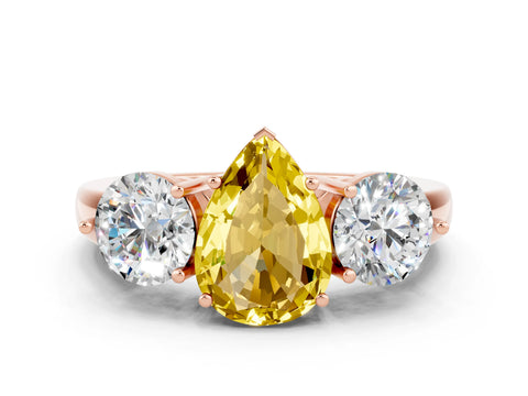 Rose gold Pear Cut Yellow Sapphire Three-Stone Ring with Prong Setting and Classic Band