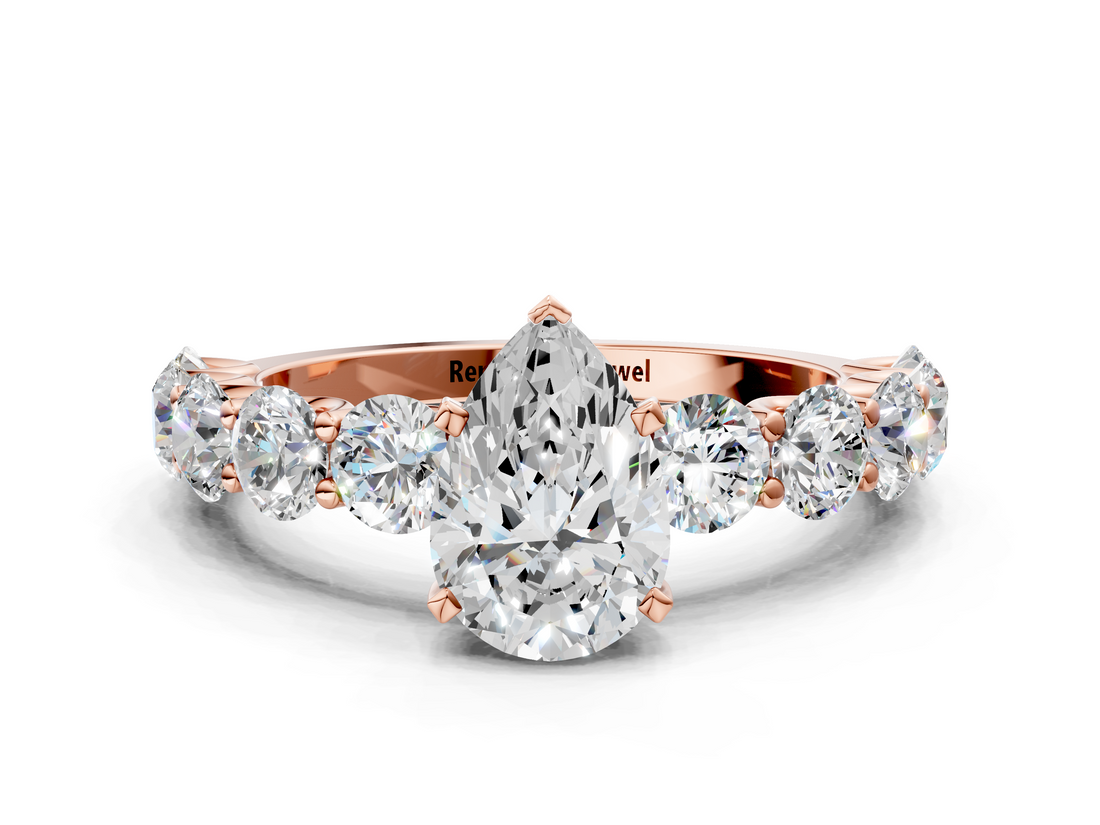 Rose gold Pear Diamond Prong Setting with Side Stones on a Pave Band_142