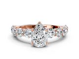 Rose gold Pear Diamond Prong Setting with Side Stones on a Pave Band_142