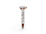 Rose gold Pear Diamond Prong Setting with Side Stones on a Pave Band_144