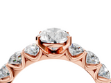 Rose gold Pear Diamond Prong Setting with Side Stones on a Pave Band_146