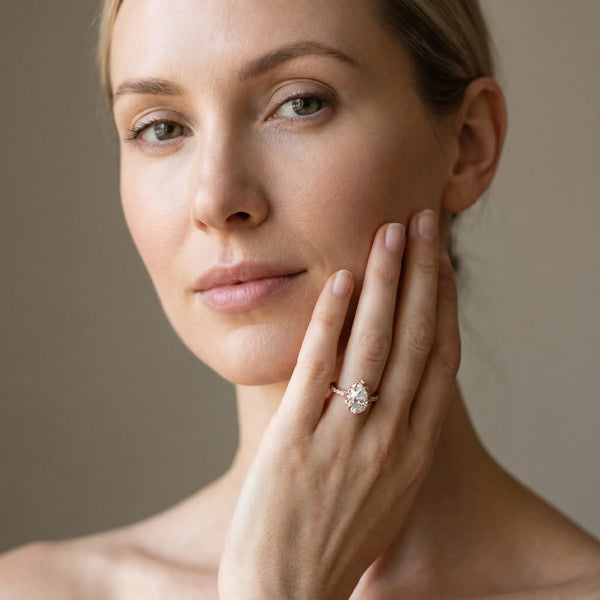 Rose gold Pear Diamond Solitaire Ring with Shared Prong Pavé Band
