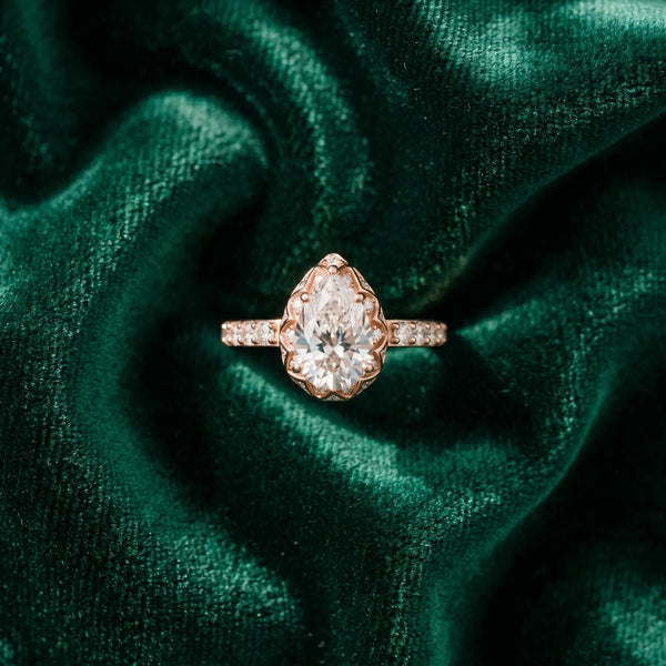 Rose gold Pear Diamond Solitaire Ring with Shared Prong Pavé Band