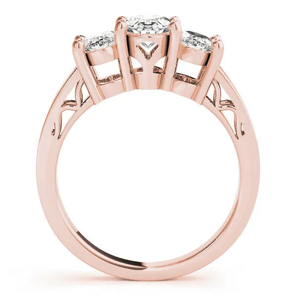 Rose gold Pear Diamond Three-Stone Ring with Prong Setting and Textured Band
