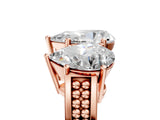 Rose gold Pear Diamond Three-Stone Ring with Prong Setting and Textured Band_11