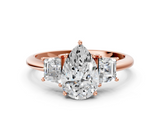 Rose gold Pear Diamond Three-Stone Ring with Trapezoid Side Stones and Prong Setting_23