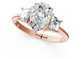 Rose gold Pear Diamond Three-Stone Ring with Trapezoid Side Stones and Prong Setting_24