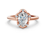 Rose gold Pear Halo Diamond Ring with Round Cluster Setting, Solitaire Band, and Four-Prong Setting_46