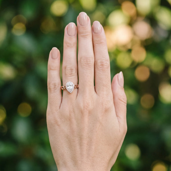 Rose gold Pear Halo Scrollwork Engagement Ring with Prong Setting
