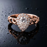 Rose gold Pear Halo Scrollwork Engagement Ring with Prong Setting_9