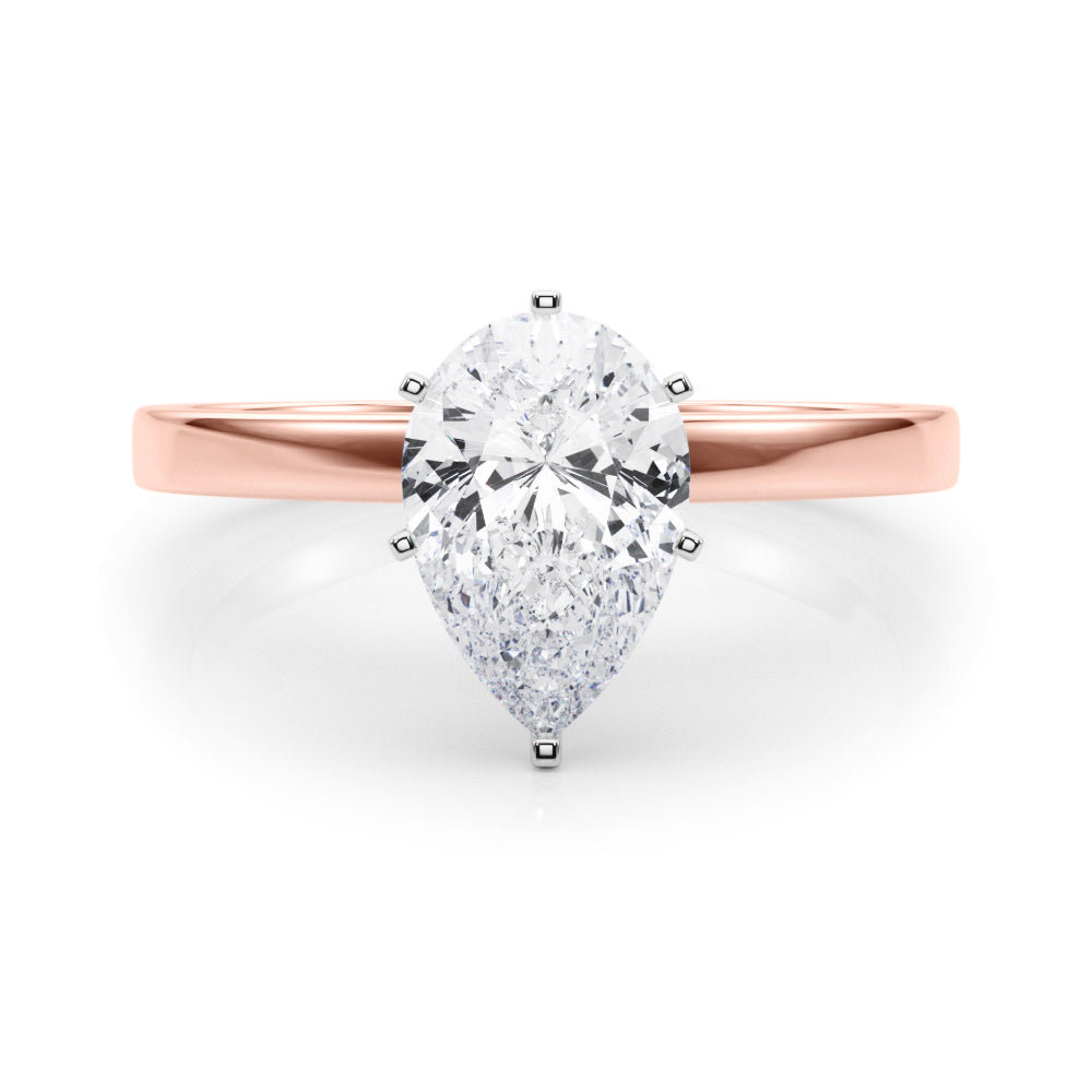Rose gold Pear Solitaire Diamond Engagement Ring with Four-Prong Setting on a Classic Band 1