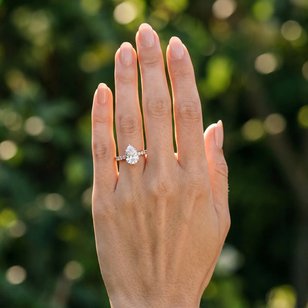 Rose gold Pear Solitaire Diamond Engagement Ring with Pavé Band and Six-Prong Setting