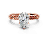 Rose gold Pear Solitaire Diamond Engagement Ring with XO Engraved Band and Four-Prong Setting