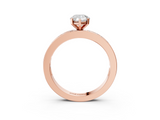 Rose gold Pear Solitaire Diamond Ring with Channel-Set Baguette Band and Four-Prong Setting_78