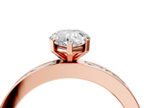 Rose gold Pear Solitaire Diamond Ring with Channel-Set Baguette Band and Four-Prong Setting_79