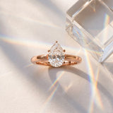 Rose gold Pear Solitaire Diamond Ring with Four-Prong Setting and Classic Band_16