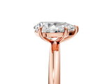 Rose gold Pear Solitaire Diamond Ring with Four-Prong Setting on a Plain Band_25