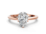 Rose gold Pear Solitaire Diamond Ring with Six-Prong Setting on a Classic Band