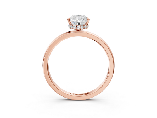 Rose gold Pear Solitaire Engagement Ring with Cathedral Band and Four-Prong Setting