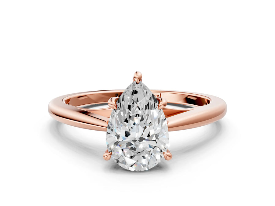 Rose gold Pear Solitaire Engagement Ring with Four-Prong Setting and Classic Band