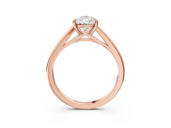 Rose gold Pear Solitaire Engagement Ring with Four-Prong Setting and Classic Band