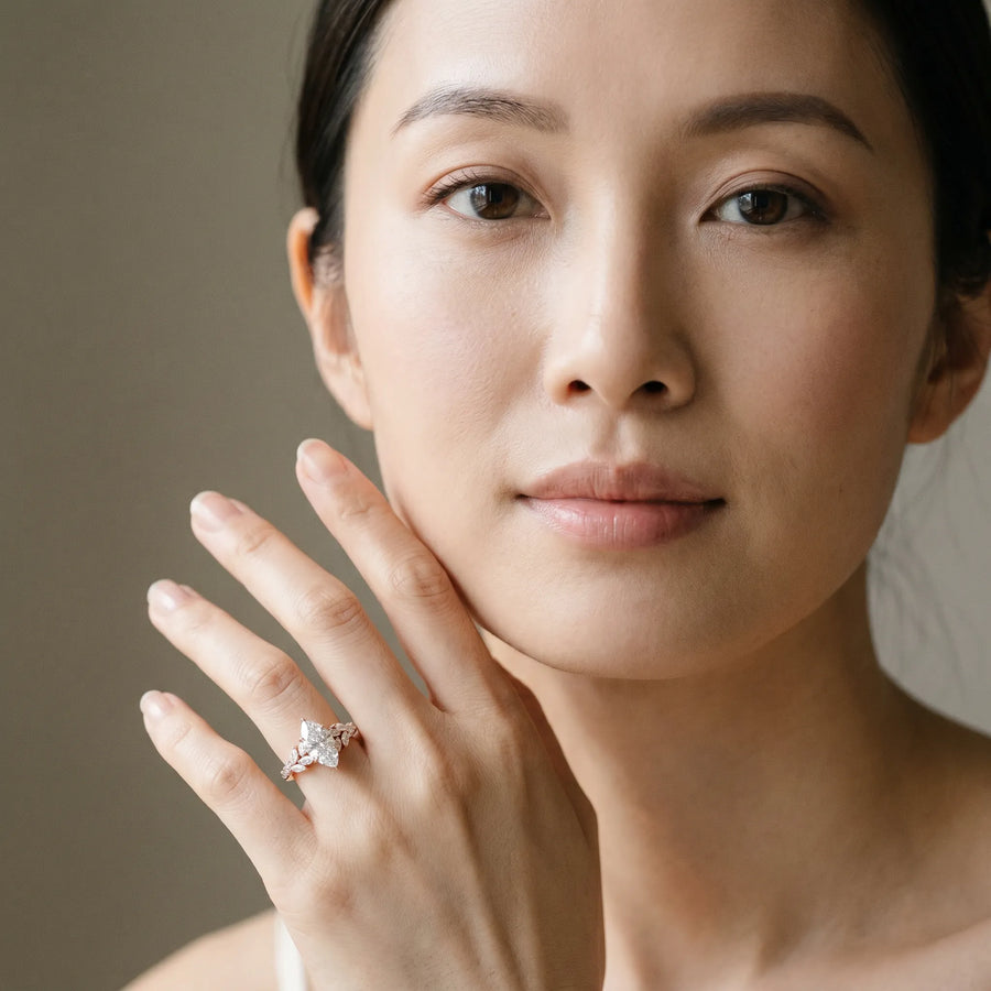 Rose gold Pear Solitaire Marquise Twist Band with Six-Prong Setting