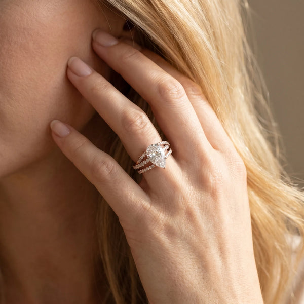 Rose gold Pear Solitaire Twist Band with Pavé Setting and Four-Prong Setting