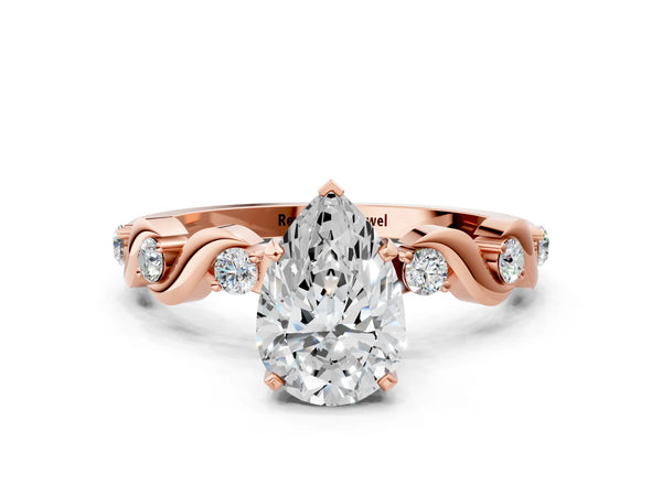 Rose gold Pear Solitaire Twisted Band with Prong Setting