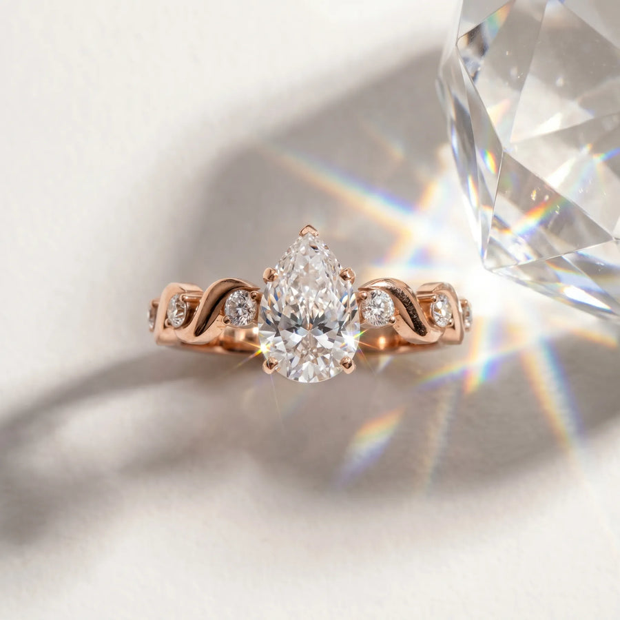 Rose gold Pear Solitaire Twisted Band with Prong Setting