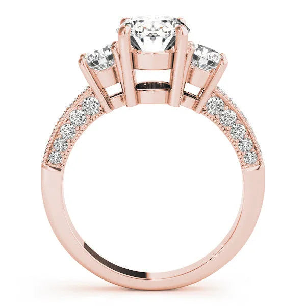 Rose gold Pear Three-Stone Diamond Ring with Pavé Band and Four-Prong Setting