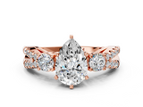 Rose gold Pear Three-Stone Diamond Ring with Pavé Split Shank and Four-Prong Setting_89