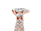 Rose gold Pear Three-Stone Diamond Ring with Pavé Split Shank and Four-Prong Setting_94